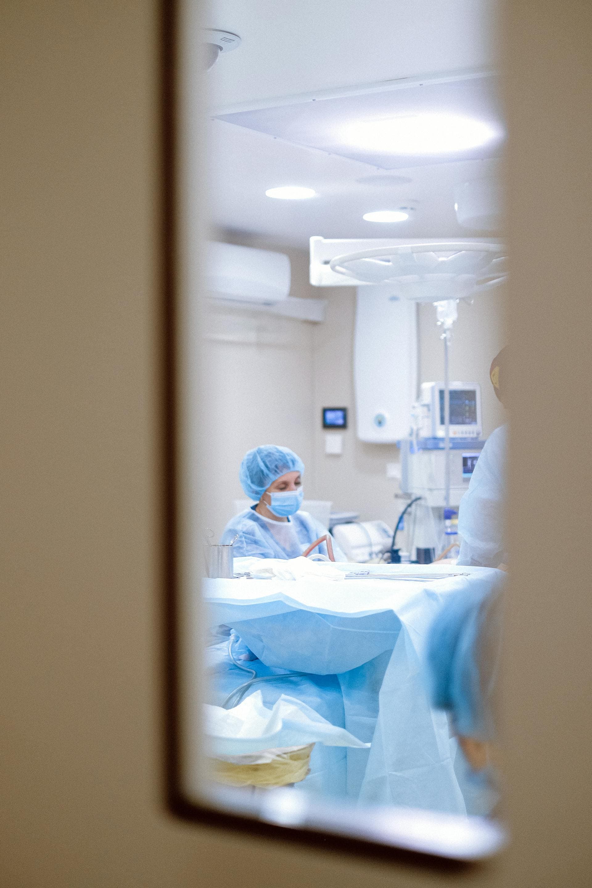Surgeon performing minimally invasive procedure
